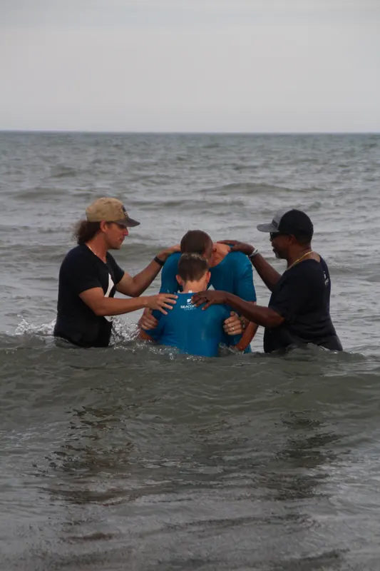 Group baptism in the ocean at Seacoast